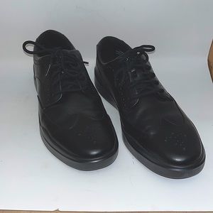 Cole Haan black wing tip comfort dress shoe size 11 1/2”. New design.